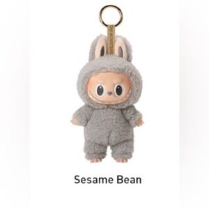 Brand new in unopened box
Authentic exciting macaron Labubu Sesame Bean